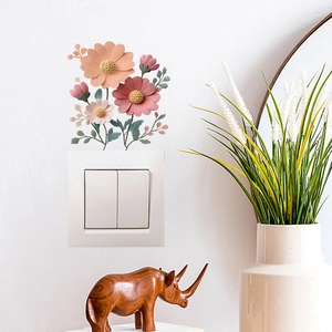 3D embossed floral wall stickers with pink cosmos flowers around a light switch decor