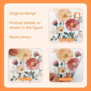Waterproof floral wall sticker detail showing orange daisy pattern and texture