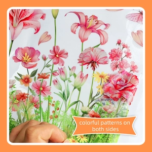 Close-up of double-sided floral window sticker showing lily and butterfly patterns