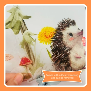 Detail of transparent PVC wall sticker showing adhesive backing and hedgehog pattern