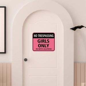 Pink Girls Only No Boys Allowed door sign sticker shown on a white arched bedroom door