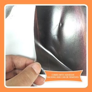 Detail of self-adhesive backing showing removable wall sticker peel-off feature