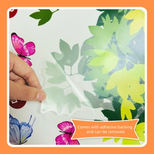 Detail showing the easy-to-peel adhesive backing of a botanical tree wall sticker