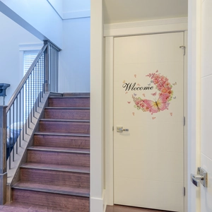 Floral Welcome door sticker with pink flowers and a yellow butterfly on a white door