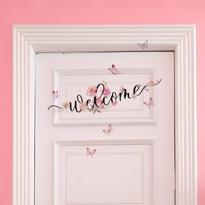 Floral Welcome door sticker with pink roses and butterflies on white wood door