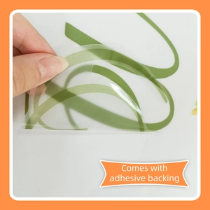 Close-up showing the transparent self-adhesive backing of the floral welcome door sticker
