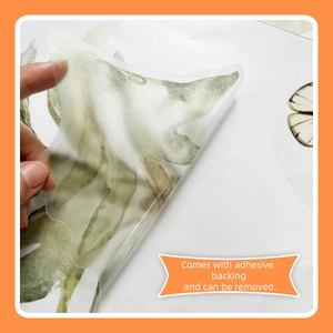 Detail showing self-adhesive backing of cartoon forest wall stickers for easy removal