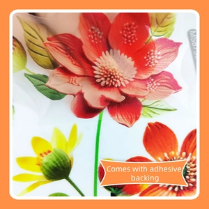 Detail der Blumen-Wandsticker mit roten und orangen Blütenblättern und Kleberückseite