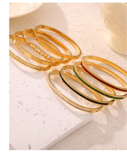 Collection of 18k gold plated stainless steel bangles with colorful enamel and zircon stones
