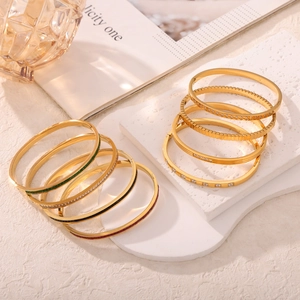 Set of 18k gold plated titanium steel bangles with diamonds and colorful enamel inlay