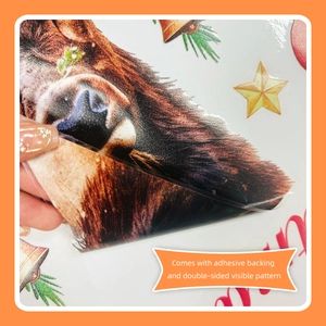 Close-up of double-sided Christmas reindeer window sticker with adhesive backing