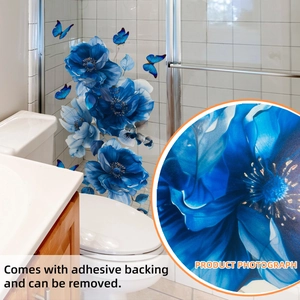 Blue floral and butterfly wall stickers applied to a glass shower door with detailed zoom