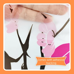 Detail of self-adhesive transparent wall sticker with floral peach blossom pattern