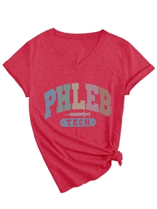 Detail of red V-neck T-shirt featuring retro medical print and side-knot hem styling