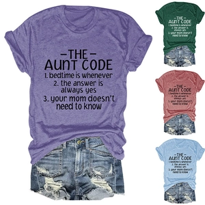 Detail view of the soft fabric texture and crew neck print on four color options of this T-shirt