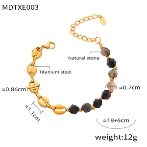 Detail of 18K gold titanium chain bracelet with black stone beads and 12g weight specs
