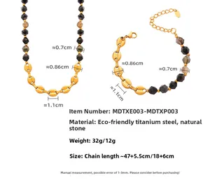 Detailed view of titanium steel chain with measurements for gold and stone jewelry set