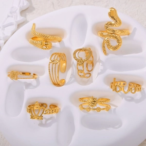 8-piece gold bohemian ring set with snake, heart, and geometric designs for stacking