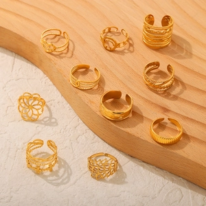 10-piece gold stainless steel geometric ring set featuring hollow floral and textured bands