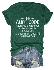 Detail view of dark green t-shirt fabric texture and The Aunt Code slogan print