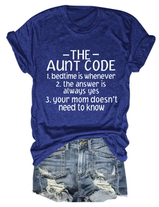 Detailed flat lay of navy crew neck T-shirt with The Aunt Code text and denim shorts