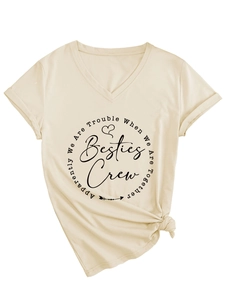 Detail of V-neck beige T-shirt with 'Besties Crew' print and stylish side knot design