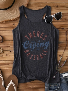 Flat lay of gray cotton tank top with distressed baseball slogan on wooden background