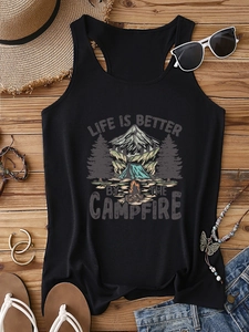 Flat lay of black campfire graphic tank top styled with summer travel accessories
