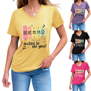 Detail of V-neck T-shirt showing musical xylophone print and multiple color options