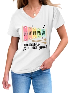 Close-up of V-neck white T-shirt with musical xylophone print and excited text