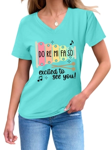 Close-up of V-neck cotton T-shirt with xylophone print and Do Re Mi Fa So excited slogan