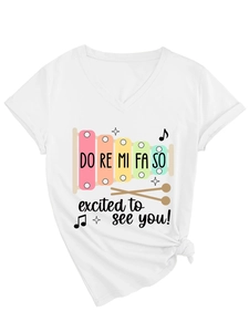 Detail of V-neck white t-shirt with musical xylophone print and excited to see you text