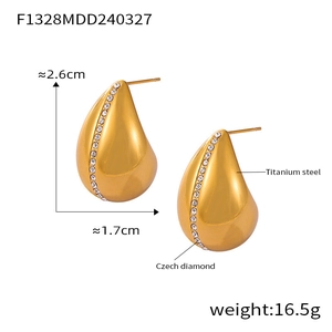 Detailed view of gold plated titanium steel teardrop earrings with Czech diamonds