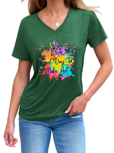Close-up of V-neck T-shirt with 'It's a Good Day To Make Art' colorful splash print