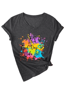 Detail of V-neck dark grey T-shirt with 'It's a Good Day To Make Art' print and side knot