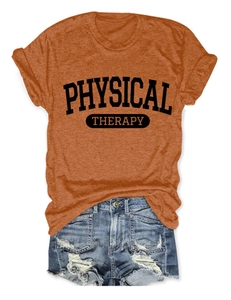 Flat lay detail of brick orange T-shirt with Physical Therapy print and denim shorts