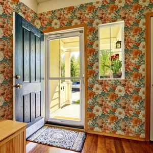 Retro floral self-adhesive wallpaper featuring orange daisies and teal leaves for home decor