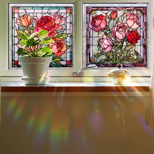 Colorful rose stained glass window film creating rainbow prism light in sunlit room