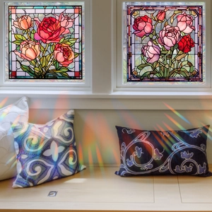 Detail view of colorful rose stained glass window film with floral patterns