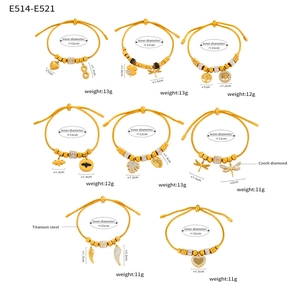 Set of 8 gold titanium steel bracelets with diamond charms like heart and tree of life