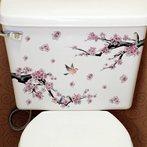 Vue détaillée de l'autocollant WC étanche avec cerisiers roses et petits oiseaux
