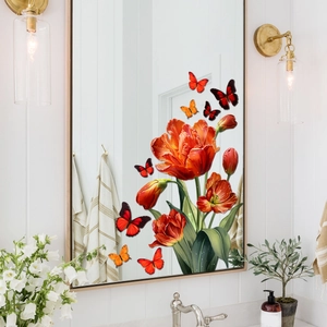 Close-up of tulip flower and butterfly static window stickers on a bathroom mirror