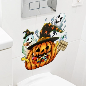 Detail of Halloween pumpkin and ghost stickers on a white toilet with flush prompt