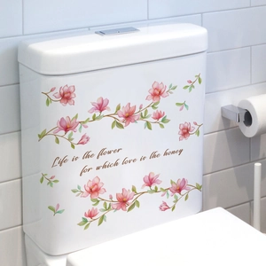 Détail d'autocollant floral rose pour réservoir de toilette avec citation inspirante