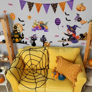 Detailed Halloween wall decal set featuring a castle, pumpkin, and witch on a gray wall