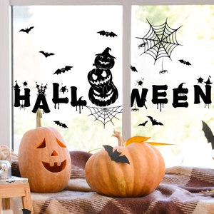 Halloween window stickers set with black bats, spider webs, pumpkins and letters