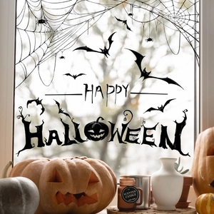 Black Halloween window clings set featuring bats, spiders and Happy Halloween text