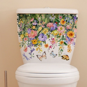 Floral toilet seat sticker with butterflies and colorful garden flowers on ceramic tank