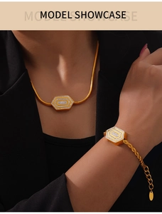 Detail von 18K vergoldetem Halsketten- und Armband-Set mit sechseckigem Diamantanhänger
