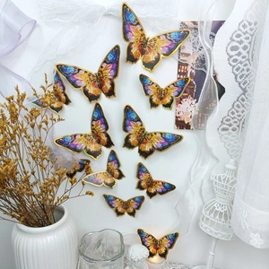 Set of 3D blue and gold butterfly wall stickers in various sizes for home decoration
